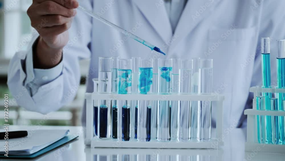 Scientist test for Covid-19 or Corona virus By using science tubes to ...