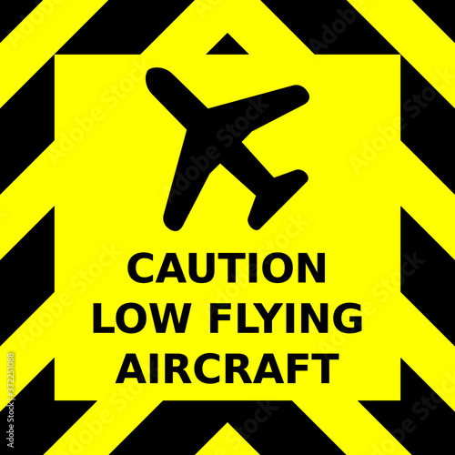 Black and yellow chevron vector graphic sign advising caution because of low flying aircraft