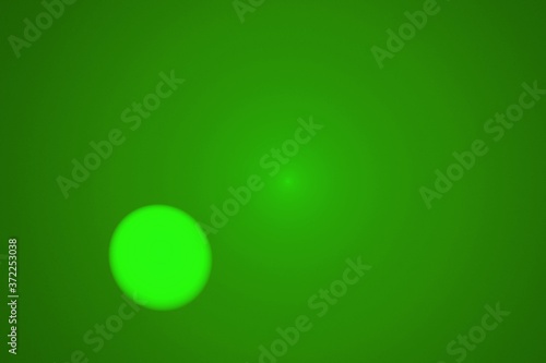 green abstract background with little glowing light