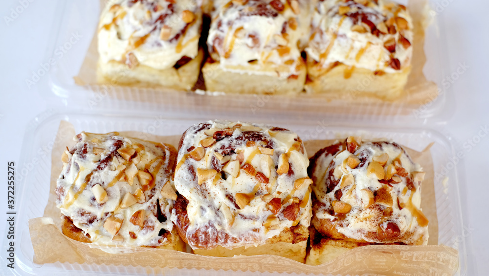 Home baking cinnamon rolls with sugar and spice sweet glazed and closeup for your happy tummy yummy food and snacks Home baking cinnamon rolls with sugar and spice sweet glazed and closeup for your happy tummy yummy food and snacks