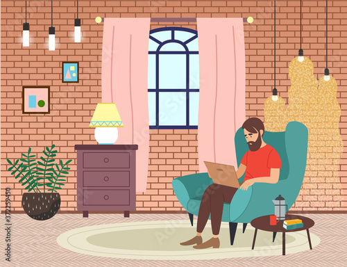 Bearded man sitting on the armchair in living room interior and correspondence surfing the Internet. Male character communicating through network on the laptop. Freelance, work from home concept
