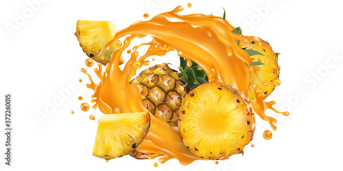 Whole and sliced pineapple in a juice splash.