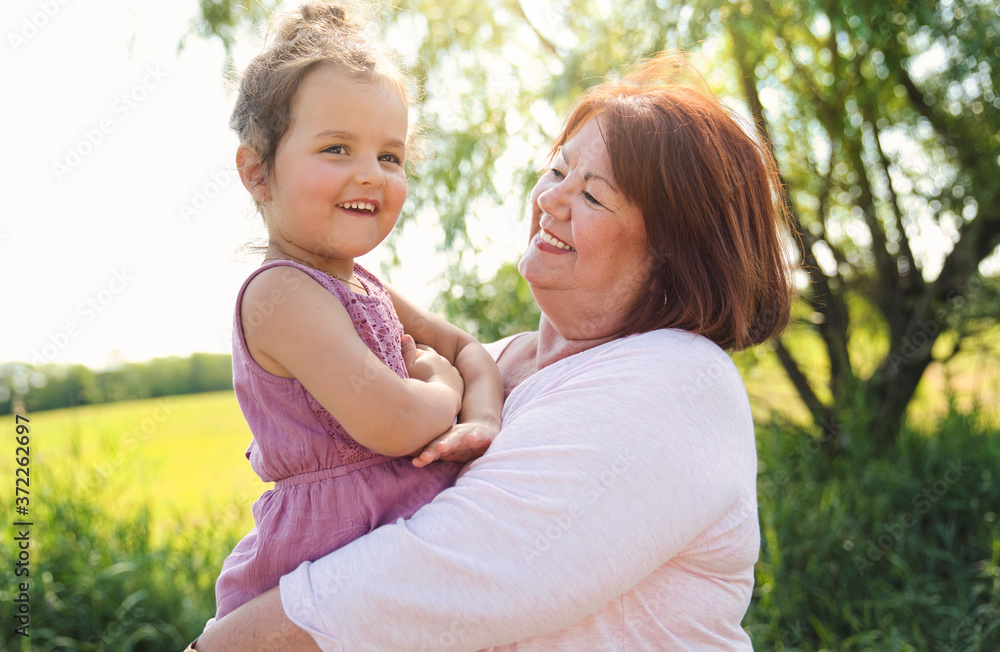 grandmother spending time with littledaughter during the day grandmother spending time with littledaughter during the day