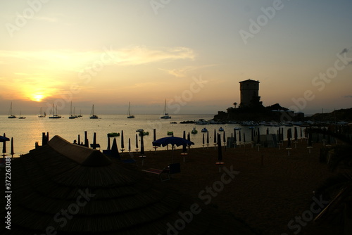 Giglio Island  Italy  a view of Campese beach and tower at sunset
