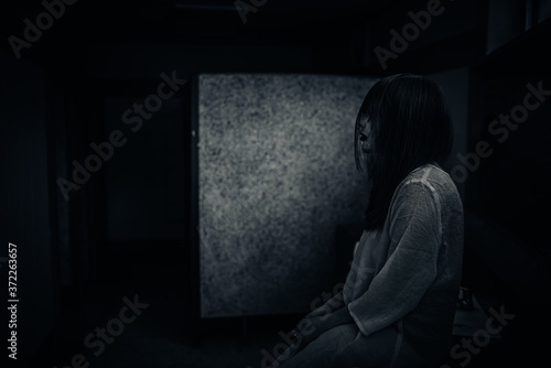 Portrait of asian woman make up ghost face,Horror scene,Scary background,Halloween poster © reewungjunerr