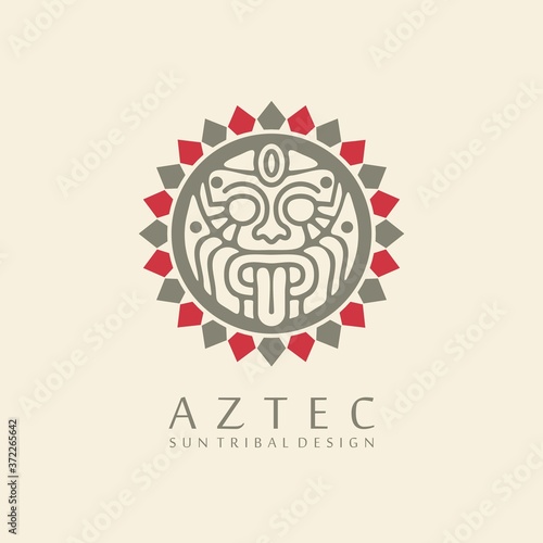 Aztec sun tribal logo design with white background and big sun symbol in the middle. Emblem with ancient idol.  
