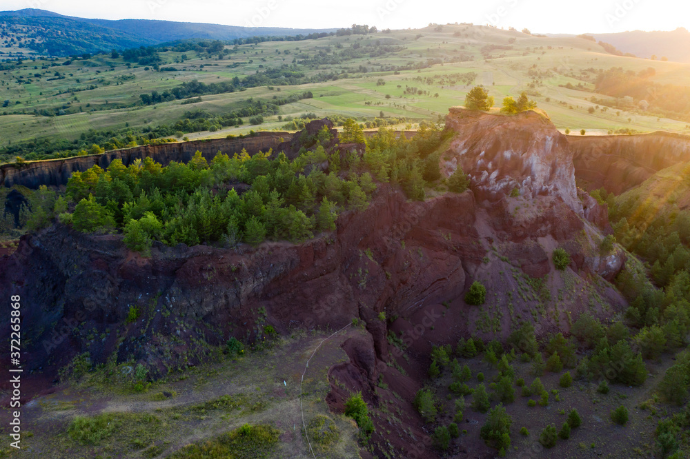 Traseu Racos Volcanic crater of Racos village, Transylvania, Romania - drone view ...