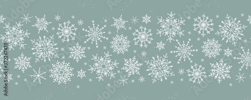 Beautiful hand drawn snowflakes seamless pattern, fragile winter background, great for textiles, banners, wallpaper, wrapping - vector design