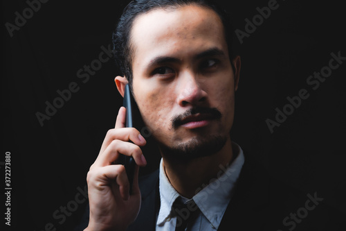 businessman using smartphon...