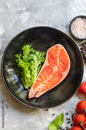 salmon red fish steak fillet seafood serving size portion product natural raw top view place copy space for text keto or paleo diet pescetarian