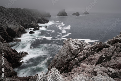 Fog at pointe de Pen-Hir on Cap de Crozon, Finistère, Bretagne / Brittany. Beautiful rough landscape of cliffs and waves in France. 