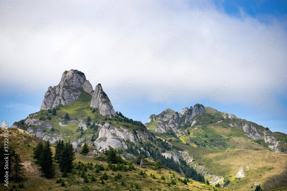 Most scenic mountain from Romania, Ciucas mountains in summer mist.