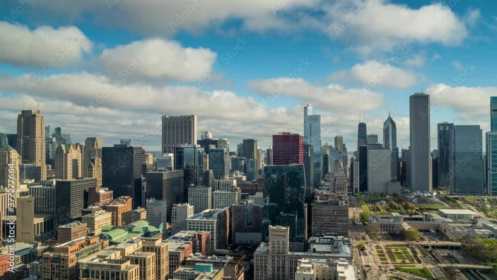 Chicago downtown at the cloudy day with sun time lapse Chicago downtown at the cloudy day with sun time lapse