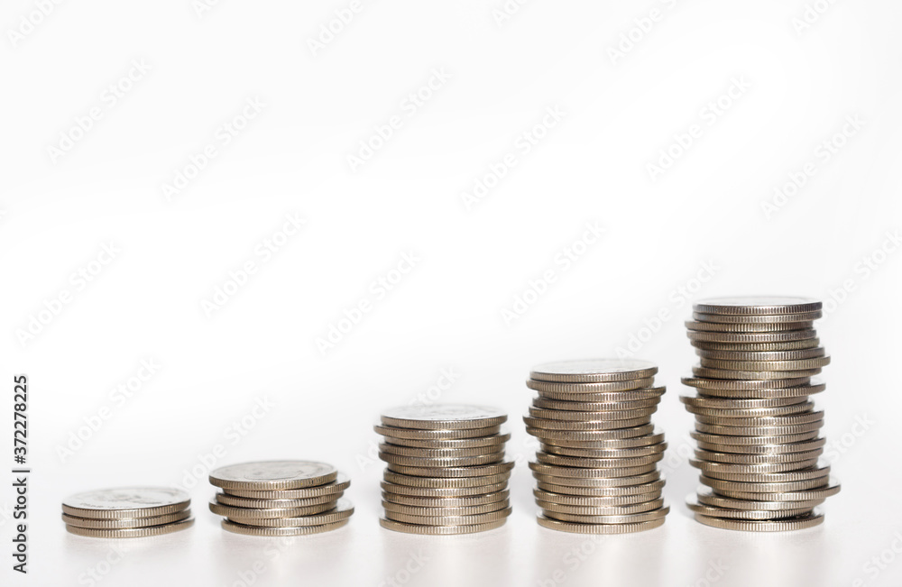 silver coin stack growth up isolated on white background with clipping path. money saving, financial grow, business startup, economy budget and investment concept. silver coin stack growth up isolated on white background with clipping path. money saving, financial grow, business startup, economy budget and investment concept.