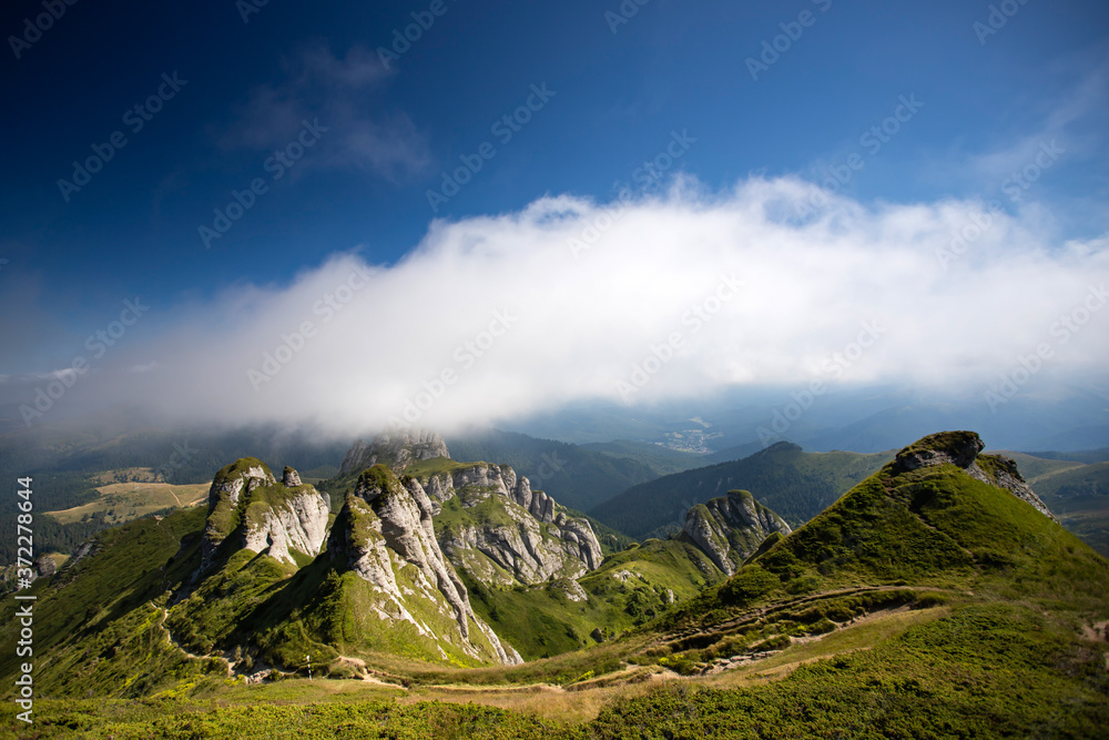 Obraz premium Most scenic mountain from Romania, Ciucas mountains in summer mist.