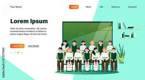 School students posing for class photo in classroom. Teen boys and girls in uniforms sitting in rows near blackboard. Vector illustration for memory, classmates, education concept