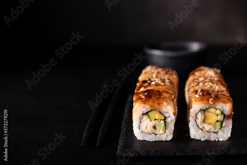roll with eel, crab and mango