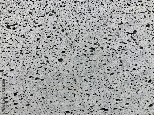 a stone pattern background with irregular holes