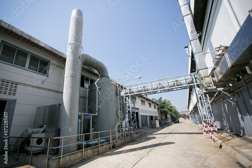 Outdoor metall air ducts ventilation system of a factory modern industry background image