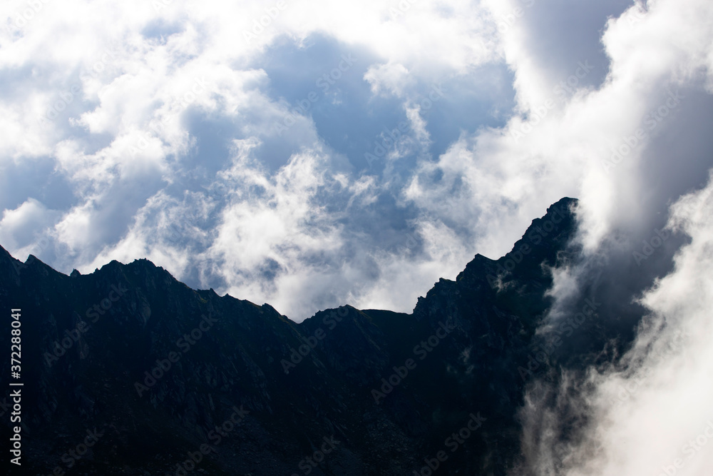 Amazing view of mountain peak in fog. Amazing view of mountain peak in fog.