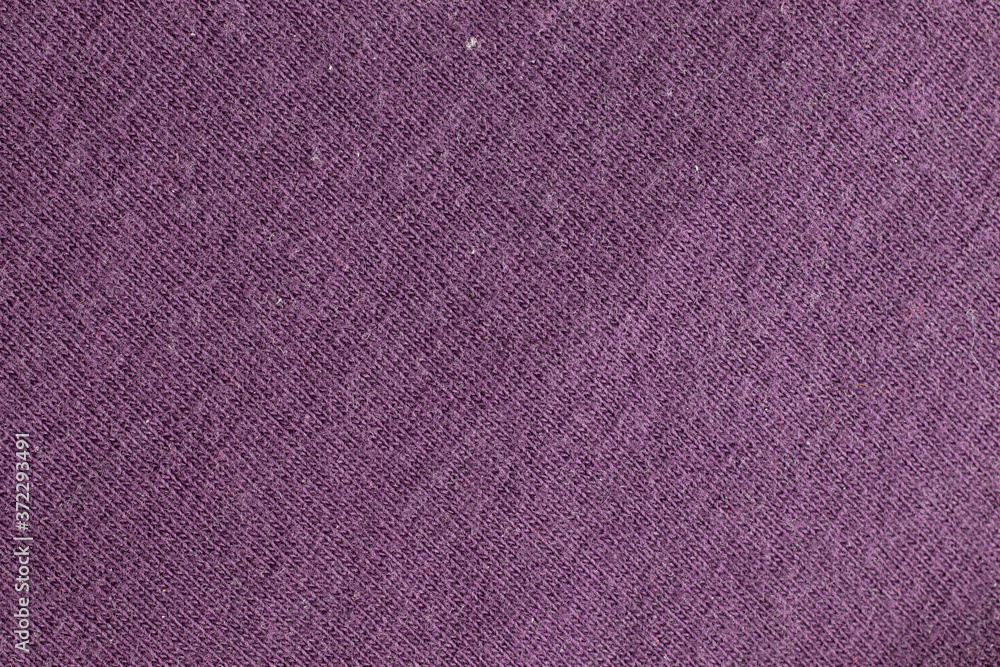 Fototapeta premium Purple textile texture background, violet tissue macro textured
