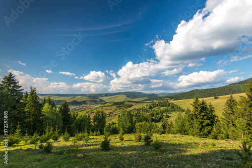 Canvas Print View from the top of the mountain, small hungarian village in the valley in Transylvania, Romania
