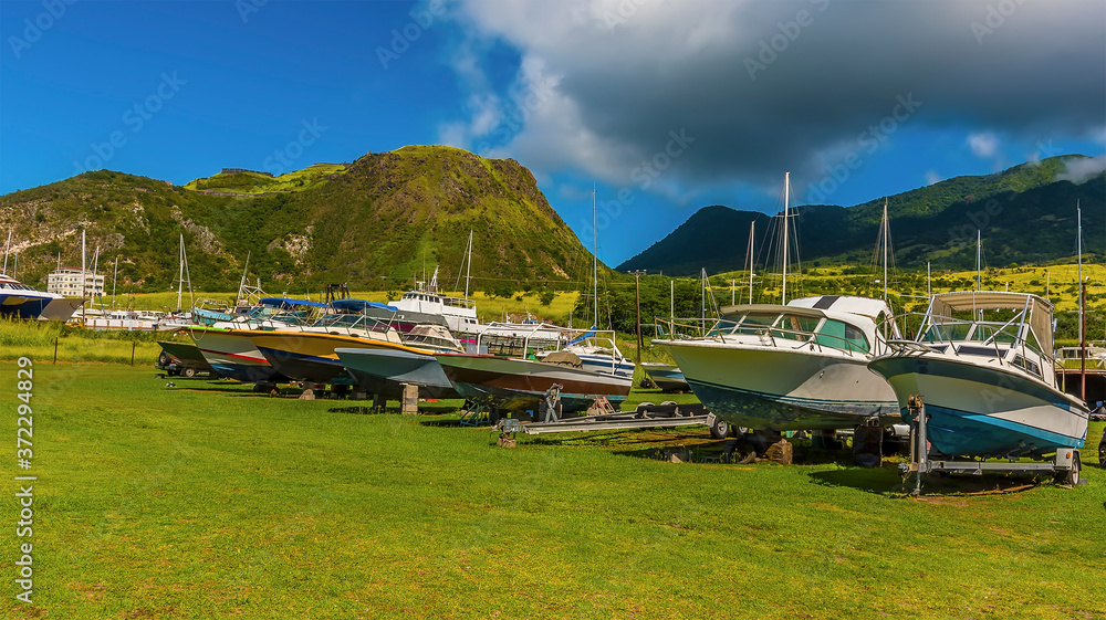 A view past a boat yard towards Brimstone Hill Fort in St Kitts