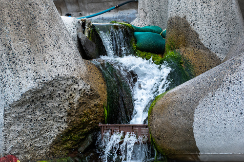 water flowing into the waterfall