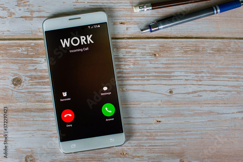 The smartphone screen is wired from the office, the workplace tracking concept and the new employment idea.