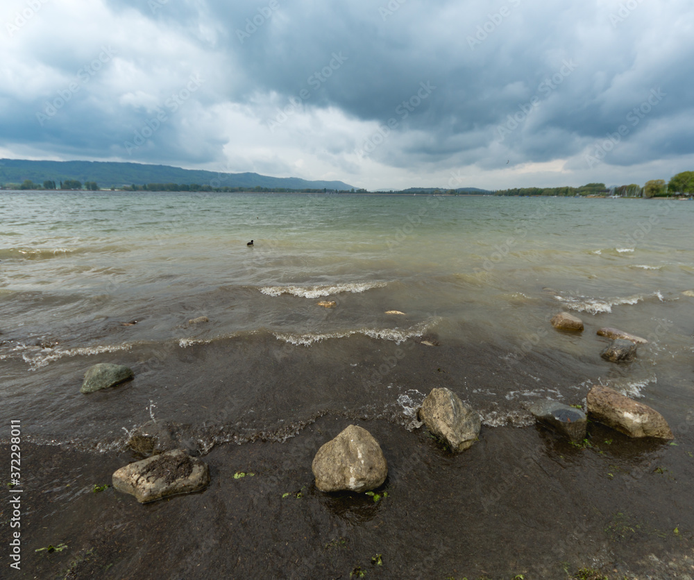 Rocks near the shore of Untersee lake, in Radolfzell, Germany