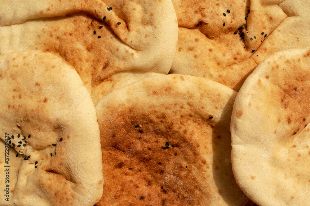 Background made of multigrain pita bread. Famous traditional Arabic
