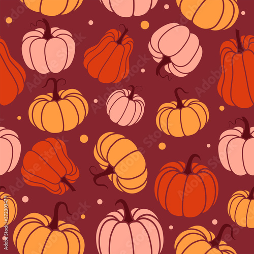 Bright cheerful pattern with pumpkins. Suitable for autumn decor, harvest festival, Halloween, healthy food.