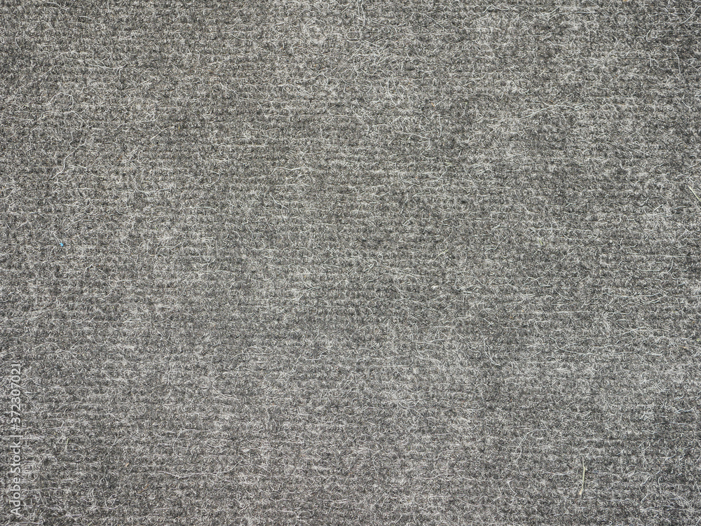 Noyabrsk, Russia - August 9, 2020: Background product sample close-up, texture fleece of light brown tones. Noyabrsk, Russia - August 9, 2020: Background product sample close-up, texture fleece of light brown tones.