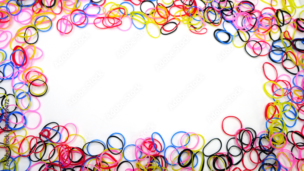 Multi-colored rubber bands on white background,Copy space. Multi-colored rubber bands on white background,Copy space.