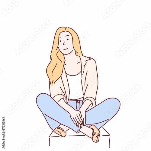 Pretty woman sitting and posing. Hand drawn character style vector.