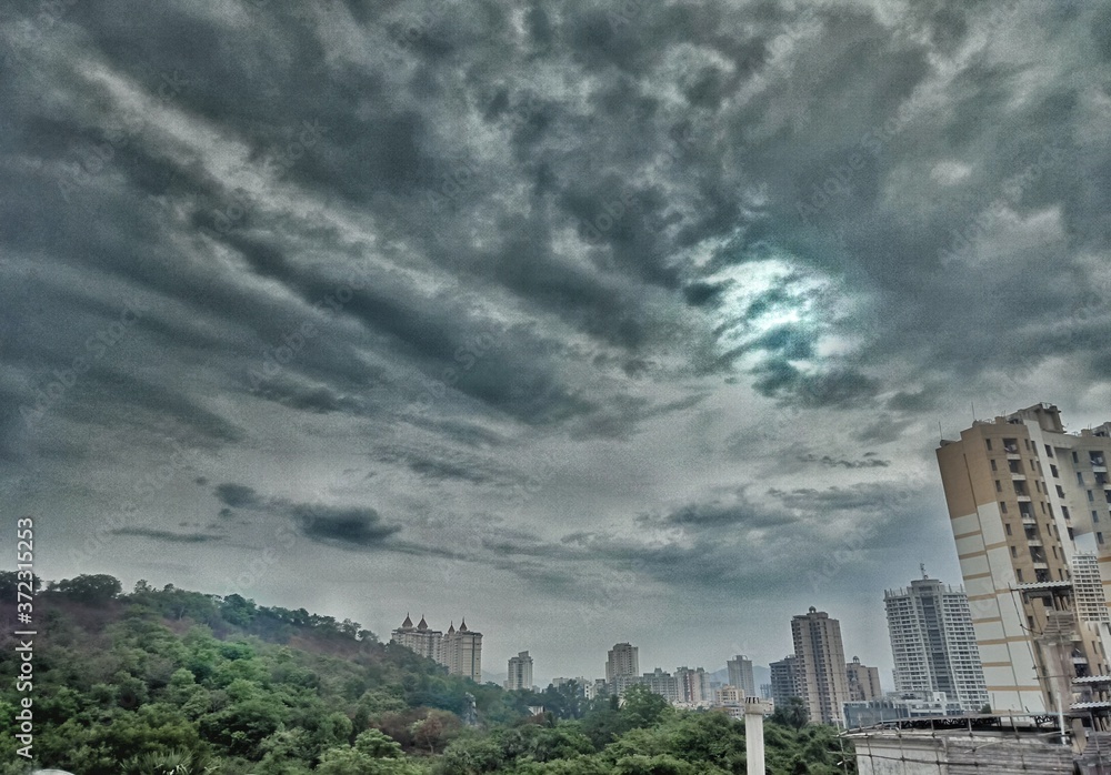 Fototapeta premium clouds over city
