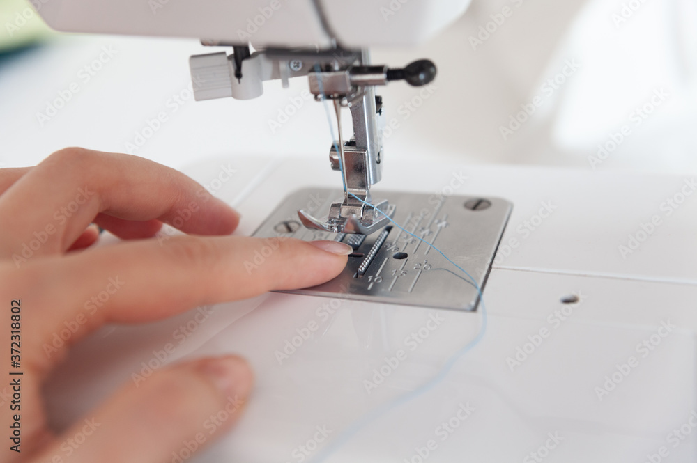 Sewing machine element on a white background. For the presentation of handwork and care of production. delicate production