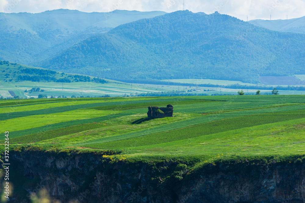 Rural landscape with field and mountains, Armenia