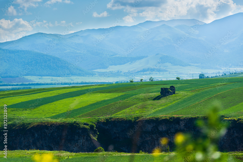 Rural landscape with field and mountains, Armenia