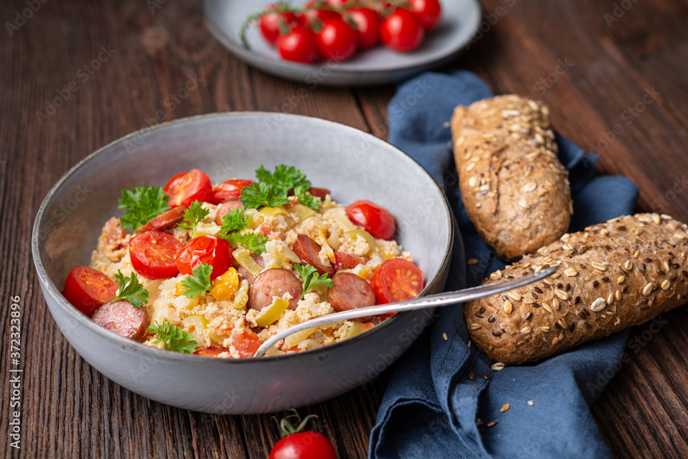 Leco, vegetable stew with tomatoes, bell pepper, onion, eggs and sausage fried slices Leco, vegetable stew with tomatoes, bell pepper, onion, eggs and sausage fried slices