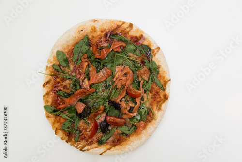 Pizza with losos on the white background. photo