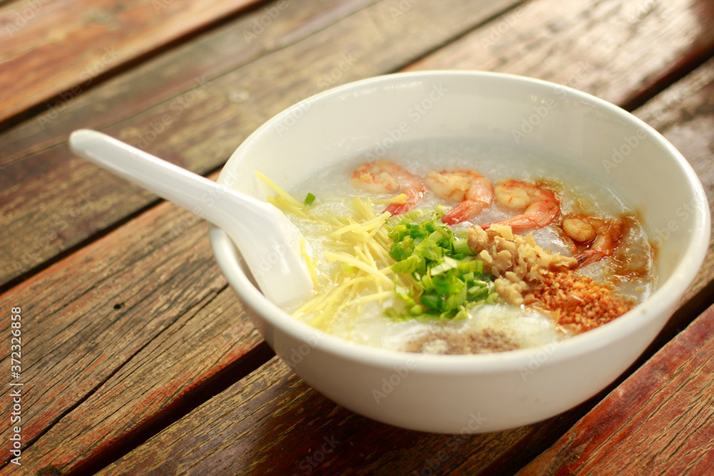 Shrimp porridge on a wooden table Sensitive focus. Shrimp porridge on a wooden table Sensitive focus.