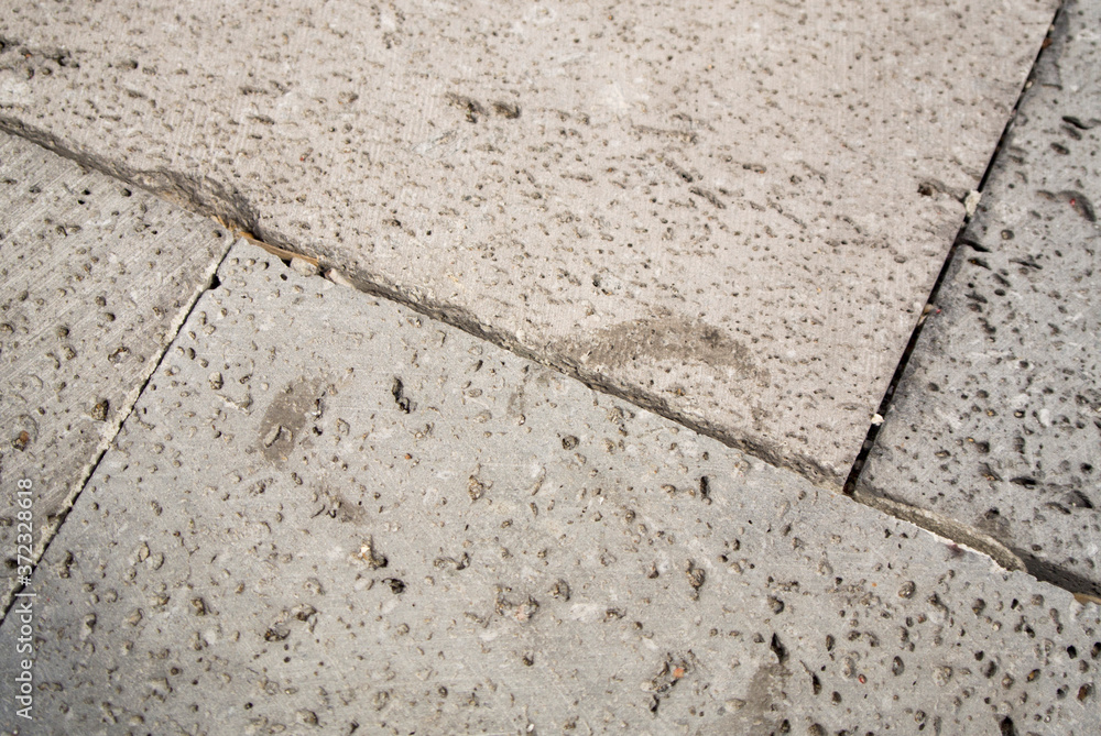 Obraz premium close-up of paving stones made of natural polished porous lava stone