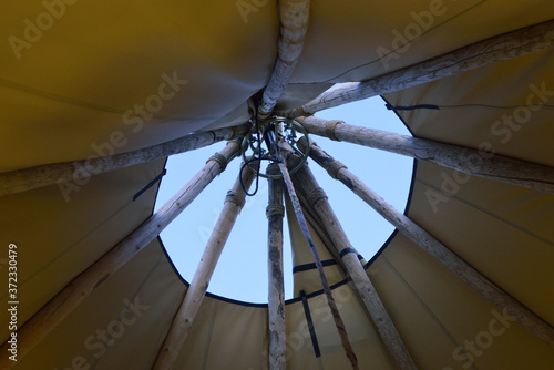 Detail of the center of the roof of a tepee.