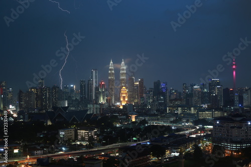 Thunderstorm lightning strike and heavy raining in Kuala Lumpur city