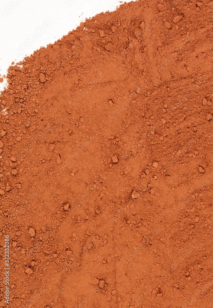 Heap of Red dry clay isolated on white background. Ochre, also spelled ocher, a natural yellow earth pigment. Pile of Red dirt (soil) on white. Heap of Red dry clay isolated on white background. Ochre, also spelled ocher, a natural yellow earth pigment. Pile of Red dirt (soil) on white.
