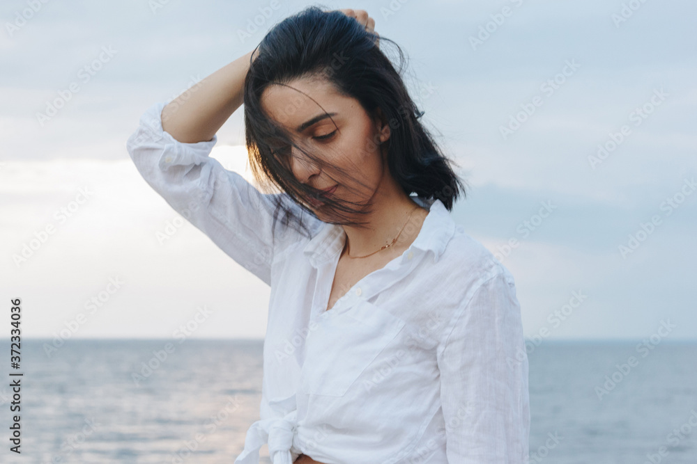 Portrait of young woman on the beach Portrait of young woman on the beach