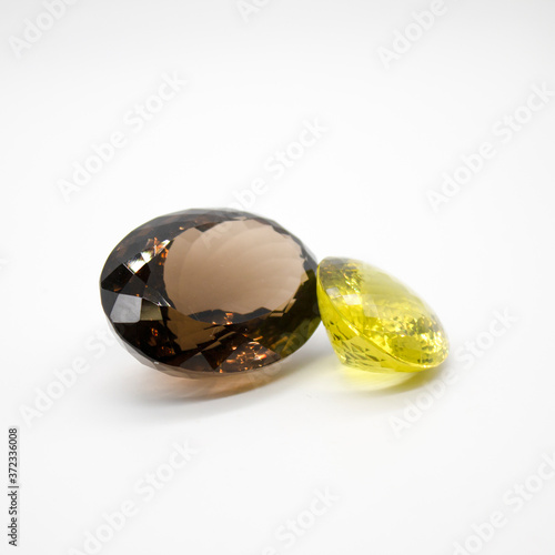 Brown And Yellow Gemstones On White Background