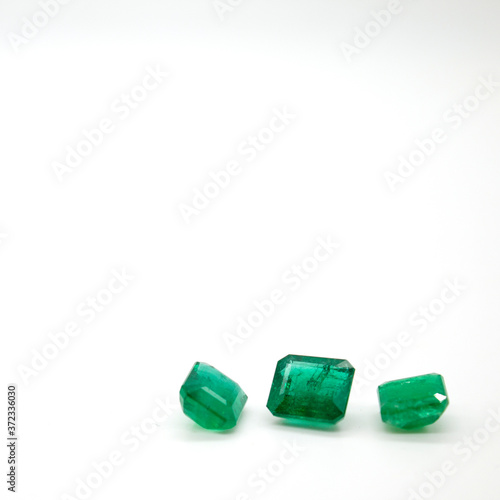Emerald Loose Gemstones On White Background