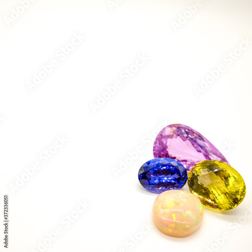 Multi-Color Loose Gemstones On White Background Pink Blue Yellow